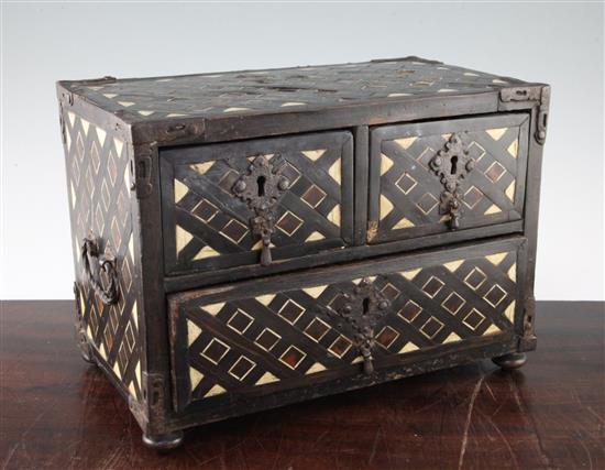 An 18th century Indo-Portuguese ebony, tortoiseshell and bone inlaid table top chest, 14.5in.